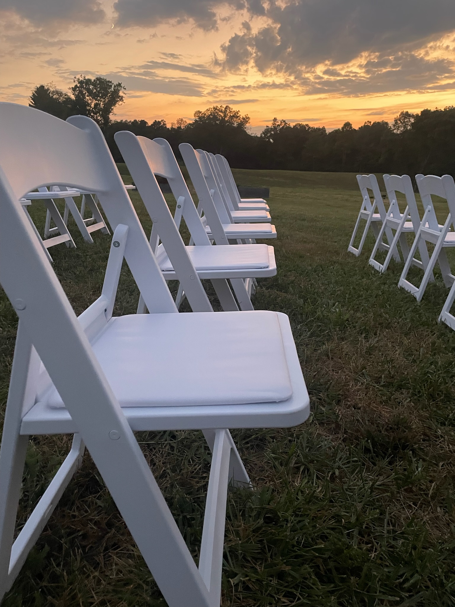 White Resin Padded Folding Chairs rental